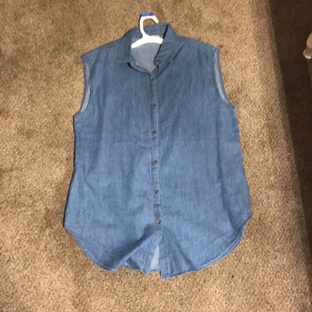 A sleeveless navy jean blouse